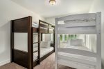 The Little Ones are Sure to Sleep Soundly in Casa Blanca`s Kids` Suite, Equipped with Two Twin-Over-Full Bunk Beds for a Cozy and Playful Retreat